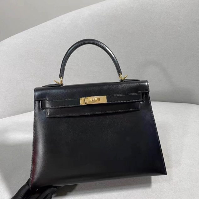  Kelly Box leather black with gold buckle